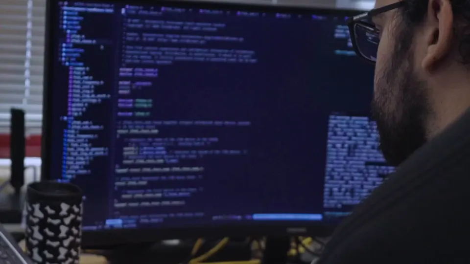 An engineer writing a test script
