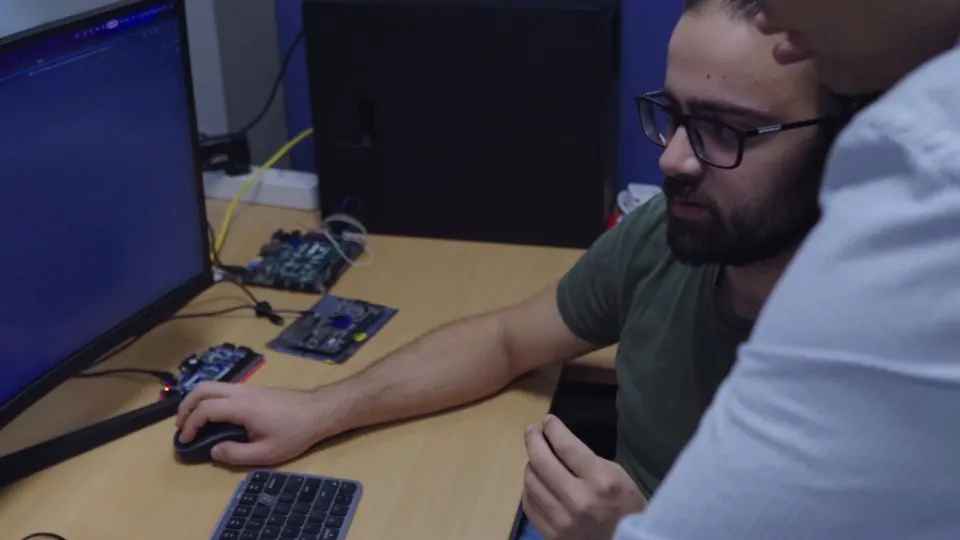 Two SOLIDKOSMOS engineers at the bench